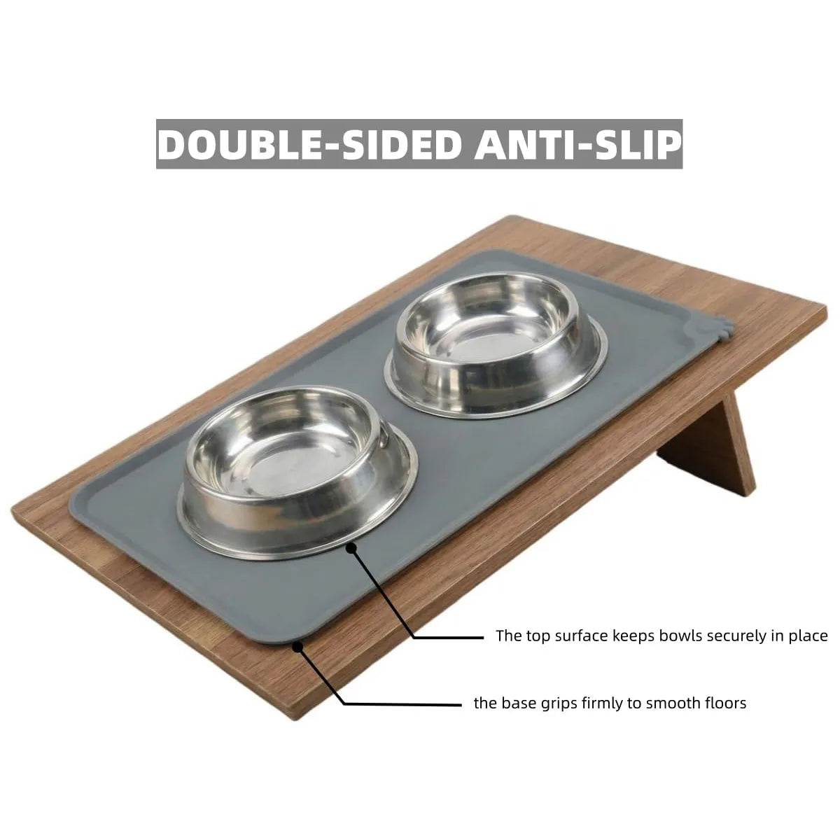 A gray silicone anti-slip mat with raised edges and a stainless steel bowl set for pet feeding.