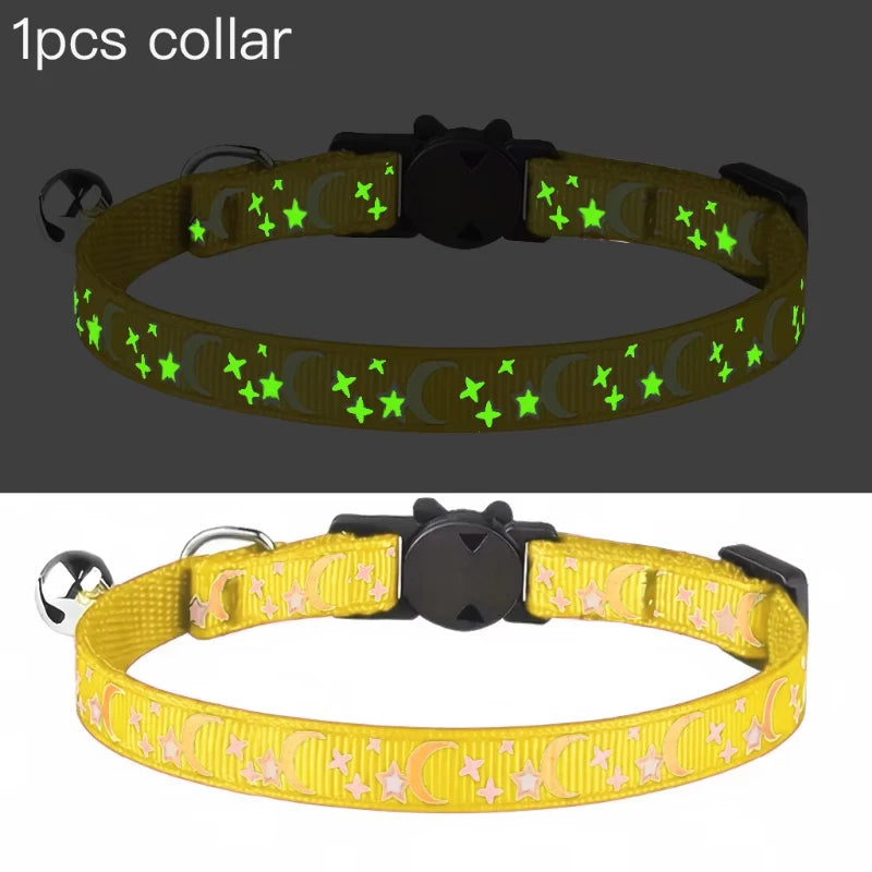 A yellow glow-in-the-dark collar with a bell featuring stars and moons for a cat or dog.
