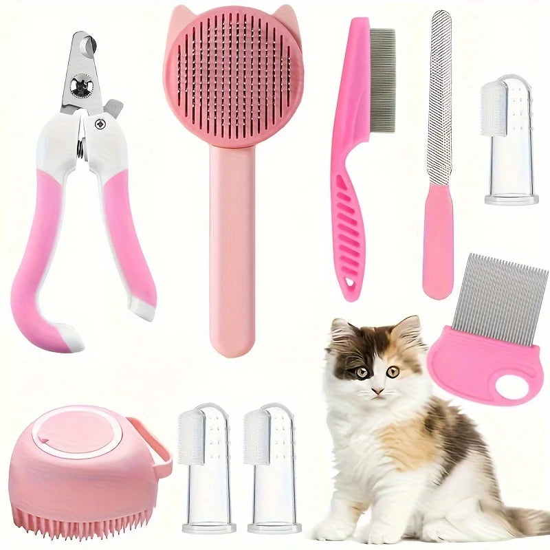 Rosa Tierpflege-Set mit Nagelschere, Bürste und Kamm neben einer Katze.