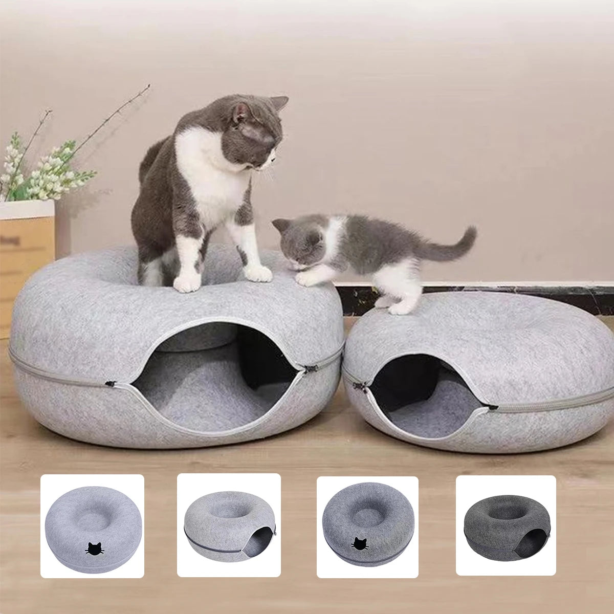 A gray cat is sitting on a round, soft pet bed with an entrance, next to four views of the donut tunnel cat bed.