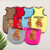 A set of five breathable cartoon bear print pet vests in brown, red, light blue, and yellow colors.
