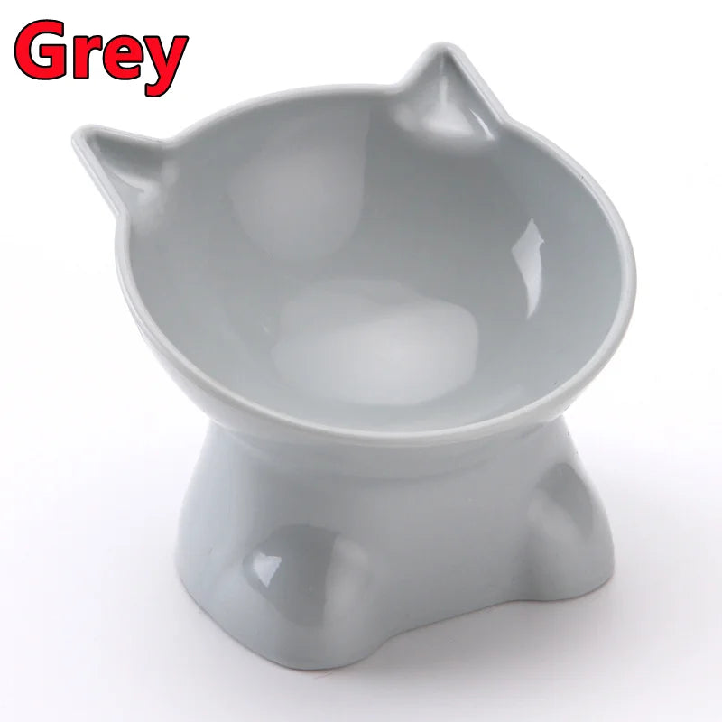 A grey ergonomic elevated pet bowl with storage designed for cats and dogs.