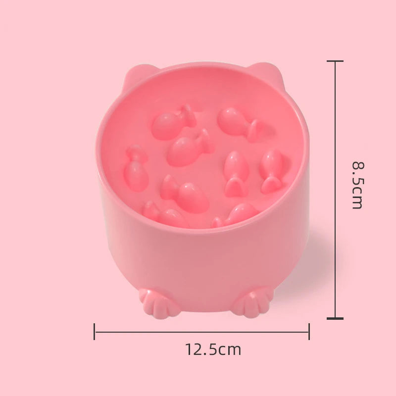 A pink anti-choking slow feeder bowl for cats and dogs, shown from the top view.