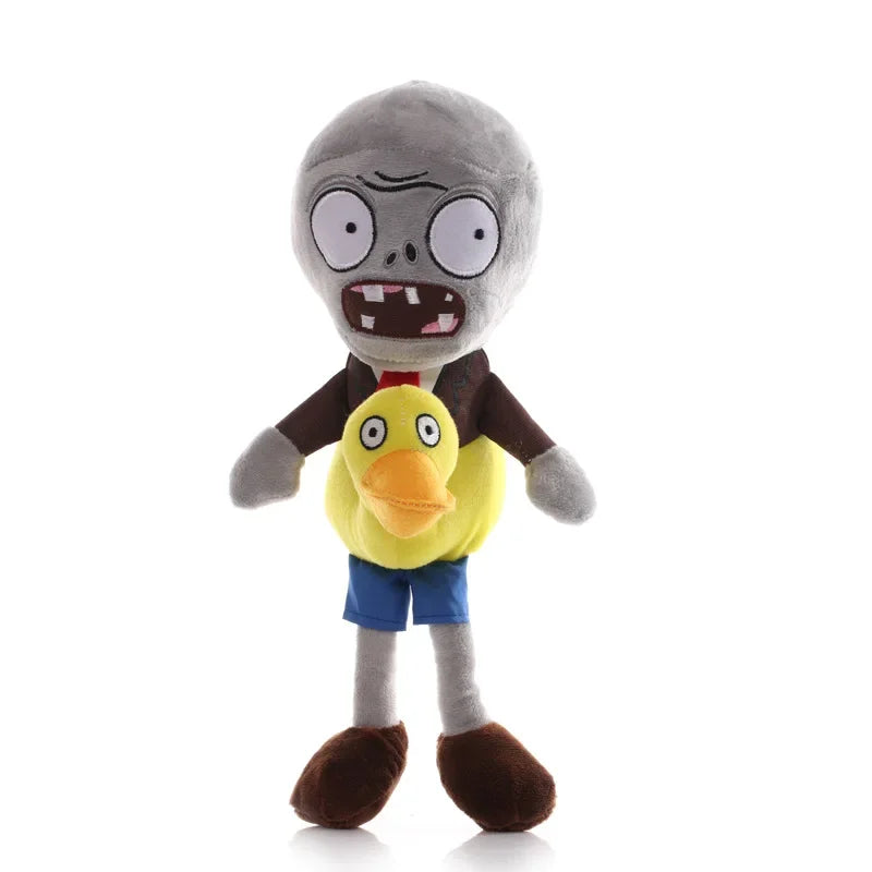 A plush toy of the Plants vs. Zombies Gargantuar, a gray monster with large teeth and a yellow head.