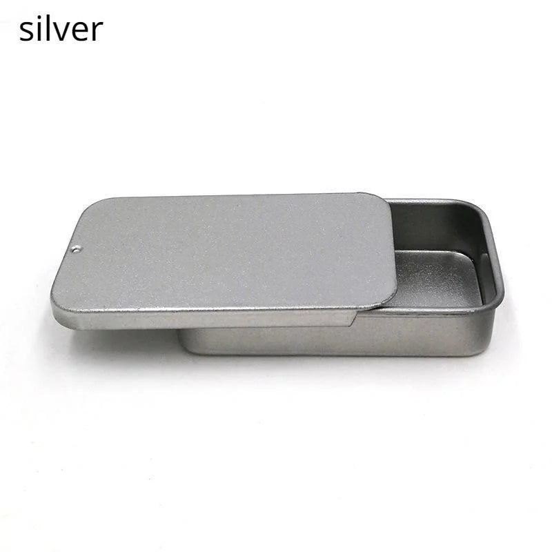 A silver ergonomic parrot training treat dispenser with a removable tray.