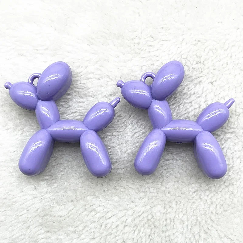 Two purple acrylic balloon dog charms for jewelry making and keychains