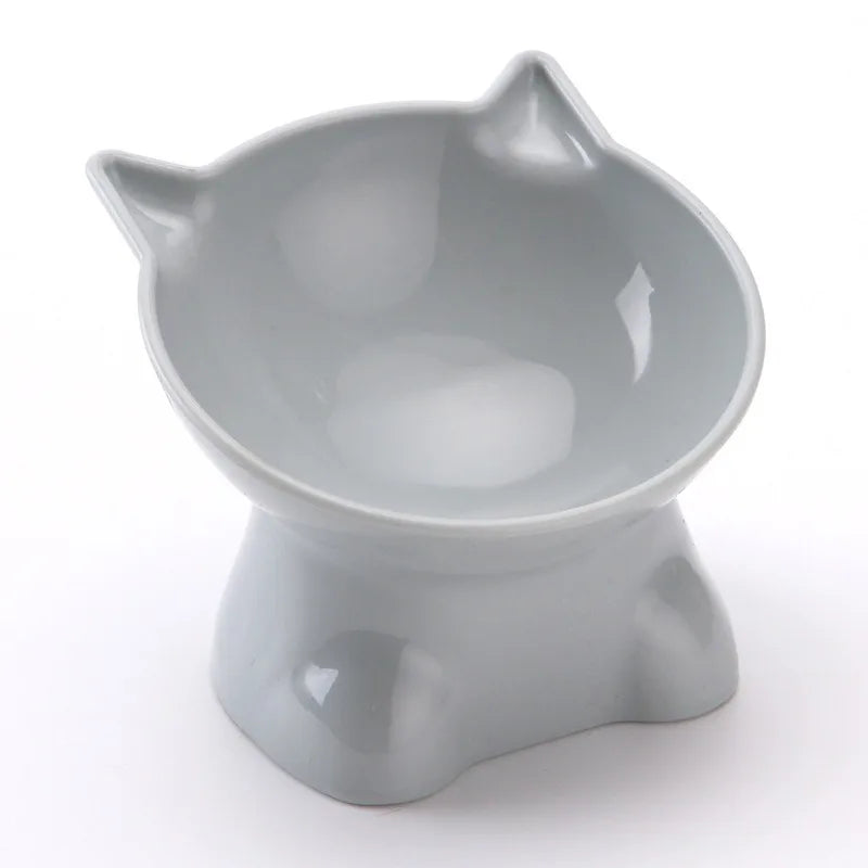 A light gray ergonomic tilted cat feeding bowl with a smooth, rounded design.