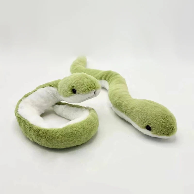 A soft, bendable green snake plush toy with white trim is shown against a white background.