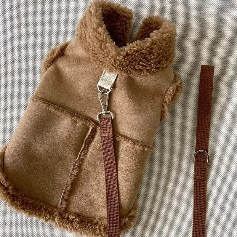 A tan luxury cotton dog vest with a brown faux fur collar and matching brown strap.