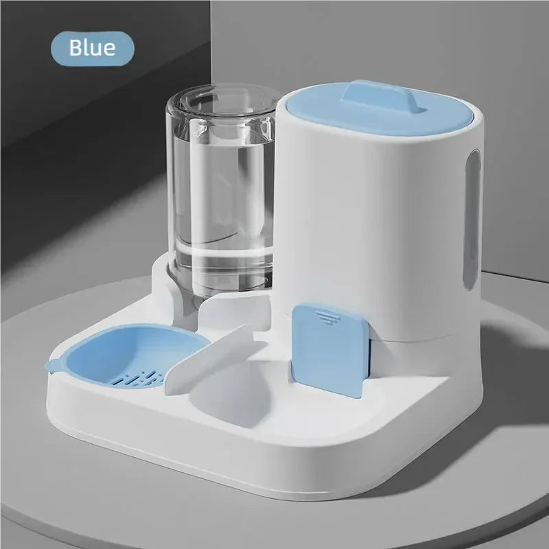 A white gravity water dispenser for pets with a blue lid and feeding tray shown on a surface.