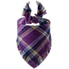 A purple and yellow plaid fabric bandana with fringed edges.