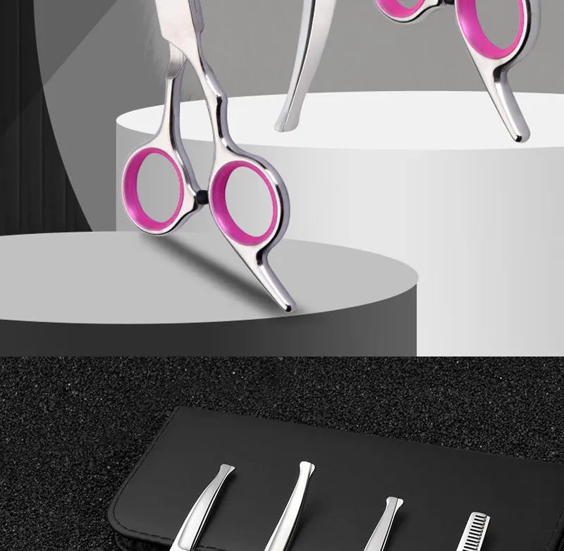 Professional stainless steel pet grooming scissors with pink handles shown in a studio setting.