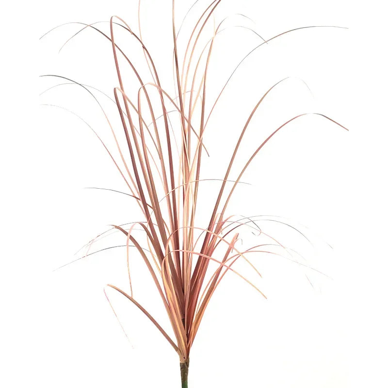 A bunch of faux grass featuring reddish-brown reeds and onion grass blades.