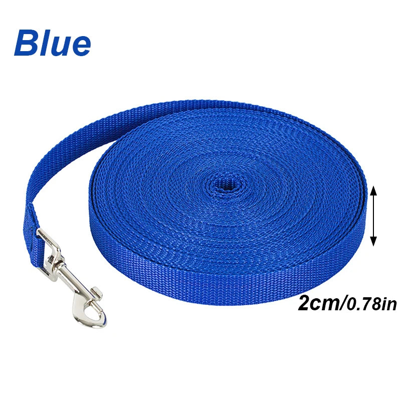 Blue nylon dog training leash rolled up for storage