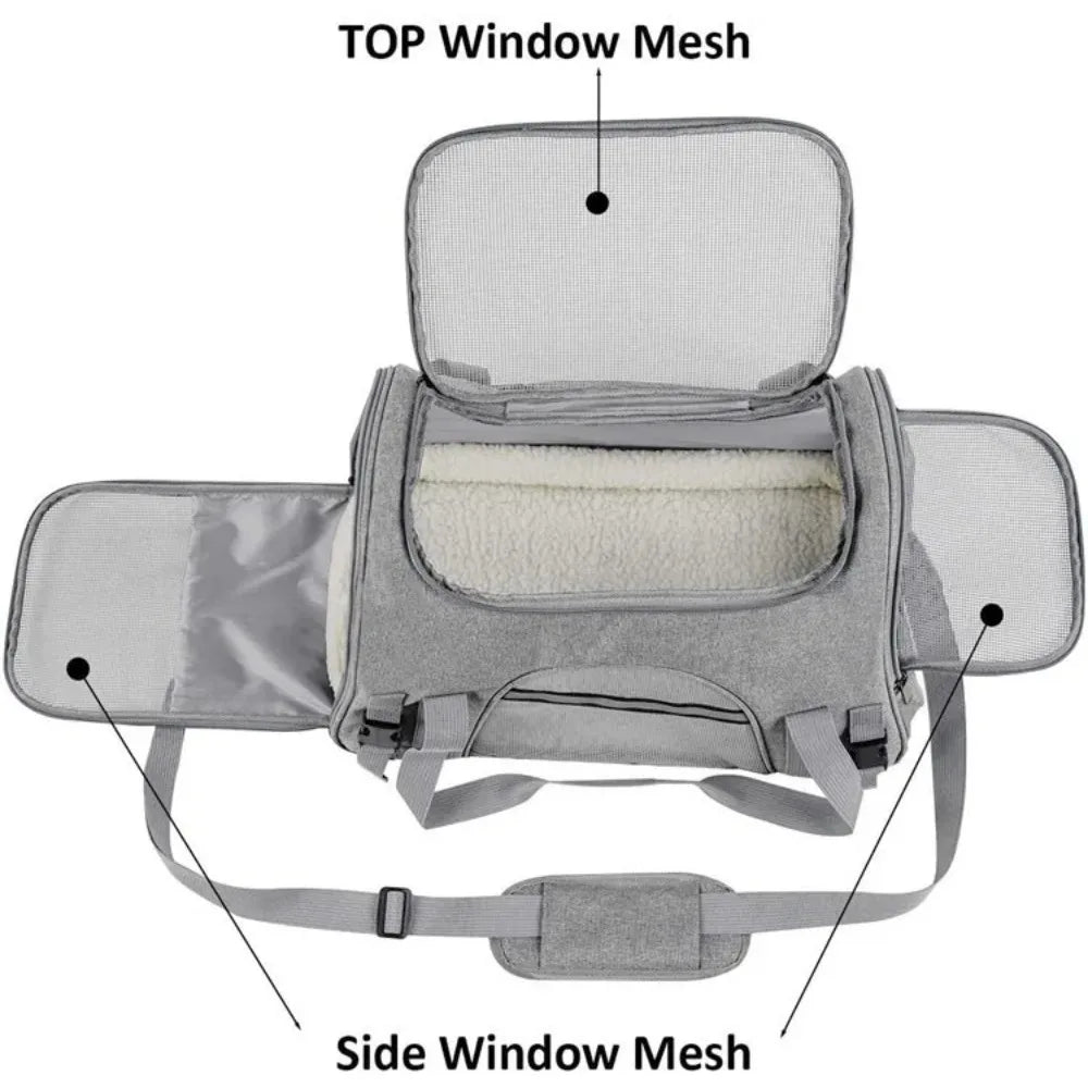 A foldable pet travel carrier bag shown with top and side window mesh panels.