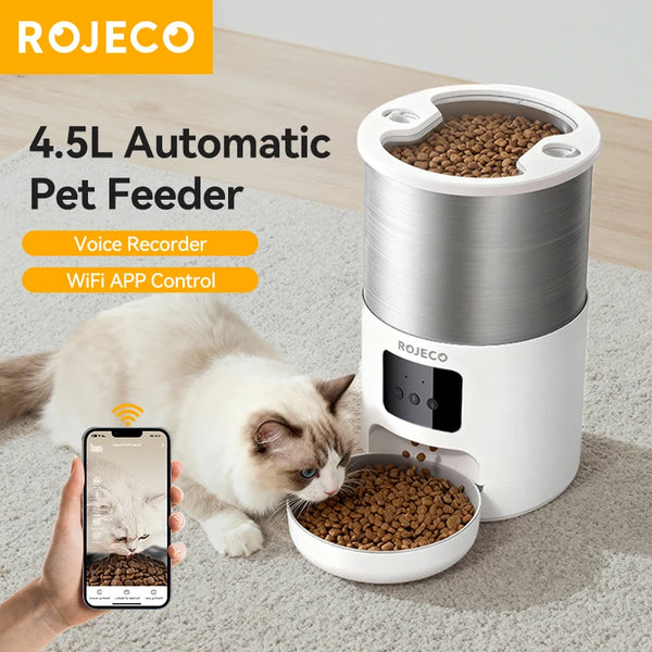 A silver and white automatic pet feeder is shown with a cat feeding from it, next to a smartphone displaying the WiFi app con