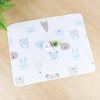A white pet cage mat featuring cute animal designs like bears, cats, and rabbits in light blue and gray tones.