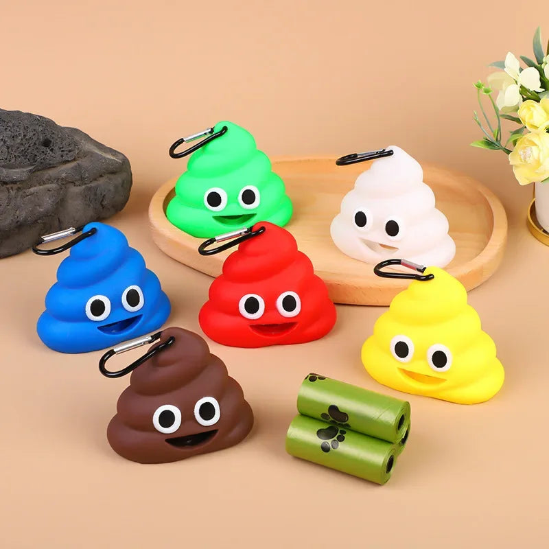 A collection of colorful silicone dog waste bag dispensers shaped like smiling animals, including green, blue, red, white, an