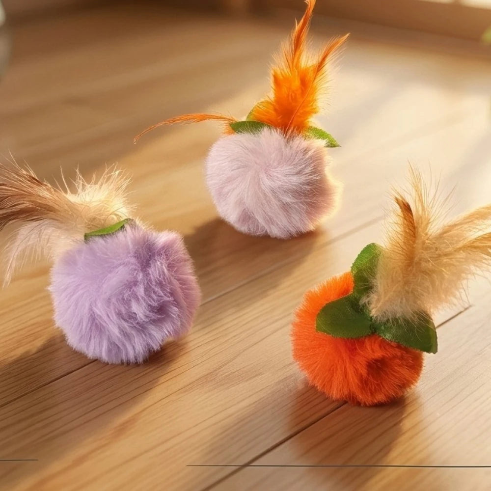 An interactive cat toy set featuring plush balls and feather teasers in shades of orange, pink, and yellow.