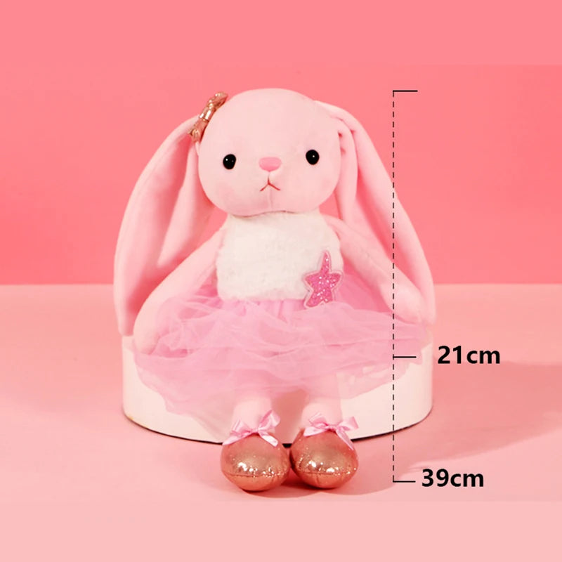 A pink kawaii plush rabbit stuffed animal toy with a sheer pink tutu and detailed measurements.