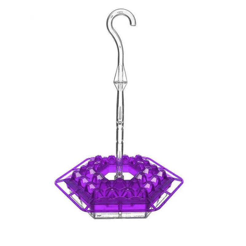 A purple hummingbird feeder with a hanging hook and a hexagonal feeding tray.