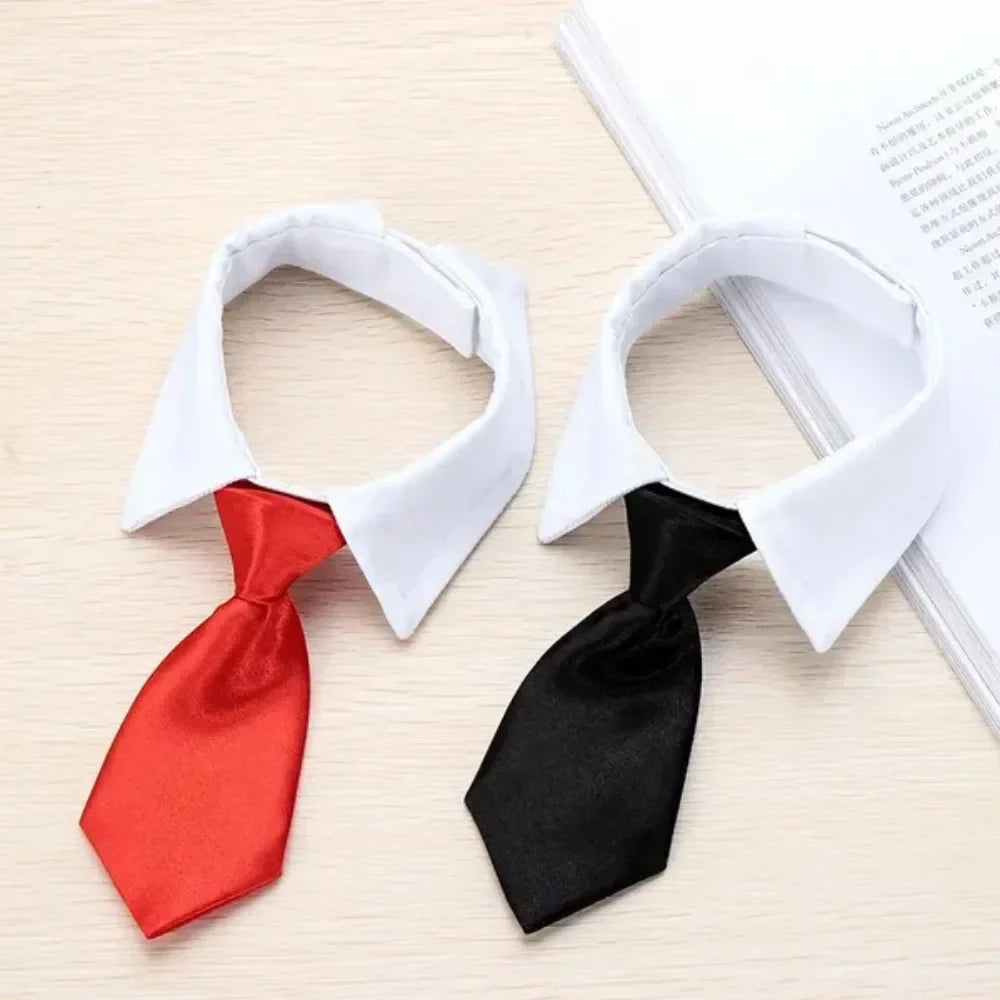 A set of adjustable pet bow tie collars in red and black fabric displayed on a light wooden surface.