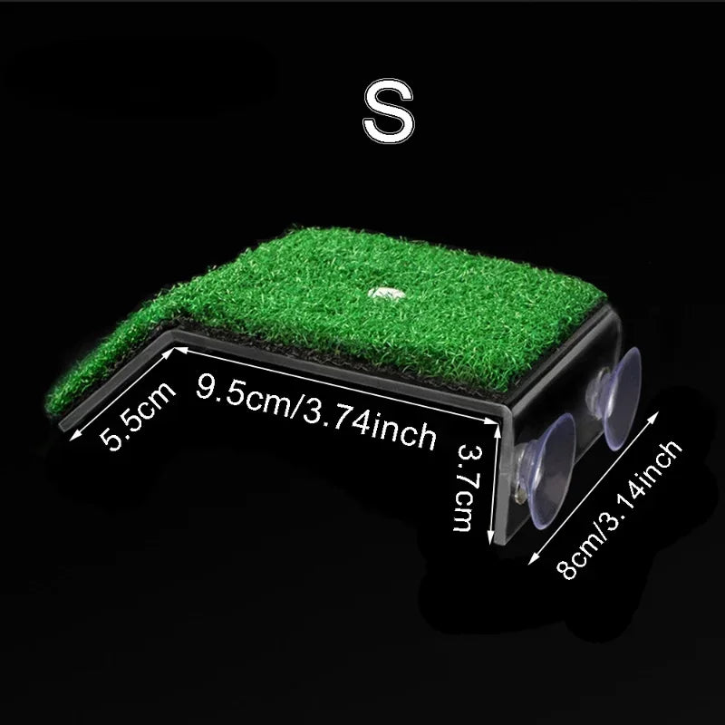 A green artificial turf basking platform with suction cups shown in a profile view.