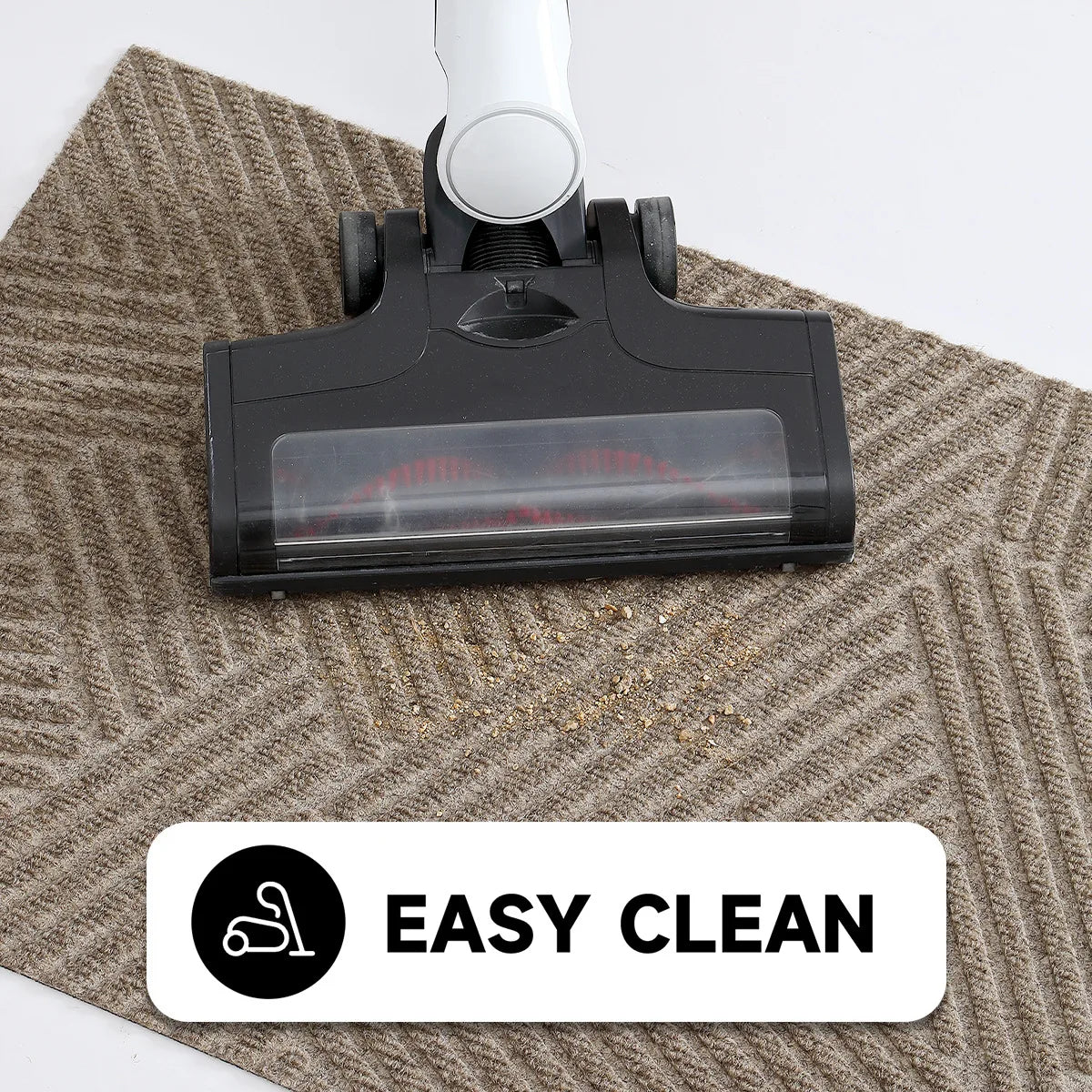 A black doormat with a clear plastic top is placed on a beige woven mat.