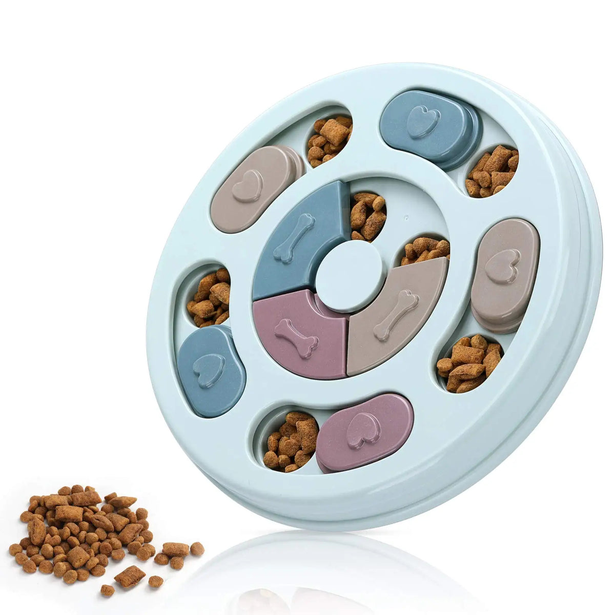 A light blue puzzle feeder toy with multiple compartments for slow treat dispensing, surrounded by small brown dog treats.