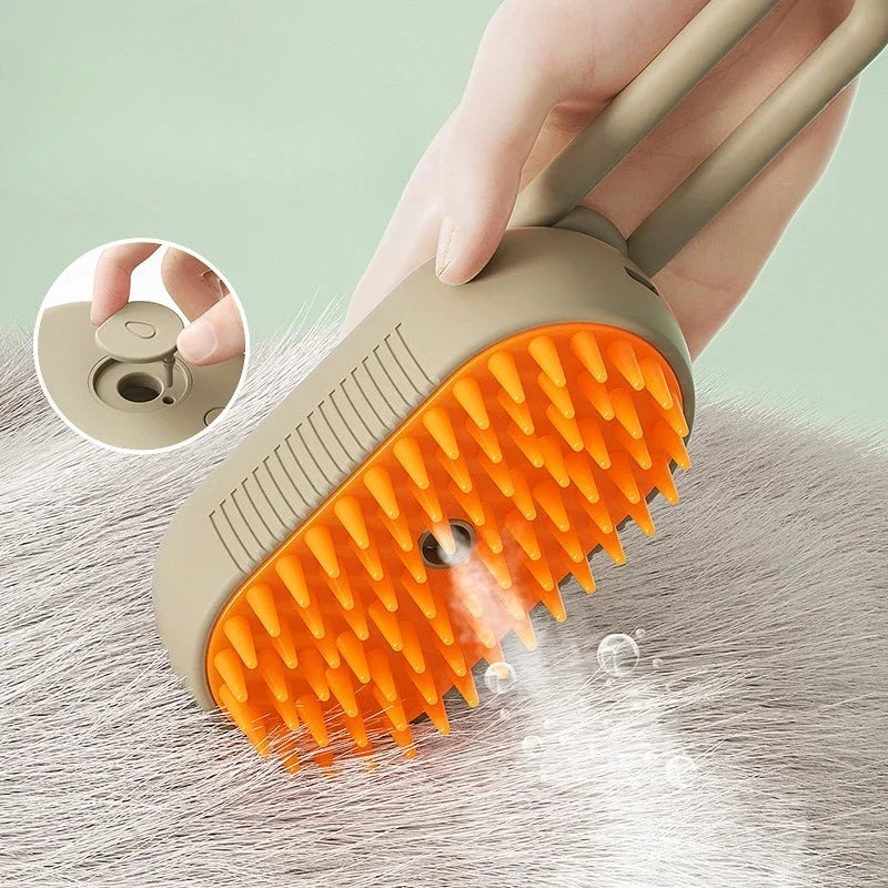 A hand holds an orange pet grooming brush with a handle and steam spray feature, demonstrating its use on fur.