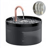 A black automatic pet water fountain with a rose gold spout and a set of silicone cleaning parts.