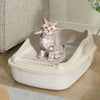 Arenero compacto de bordes altos para gatos