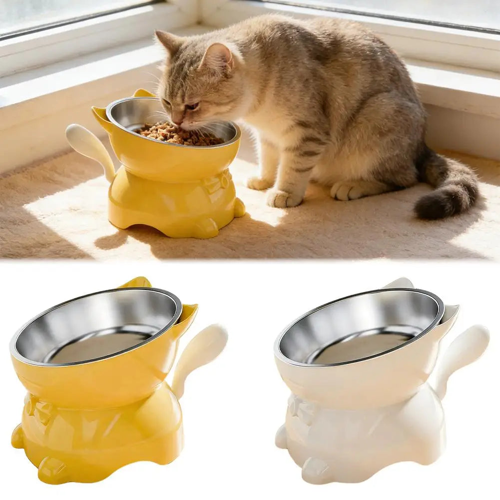 A tabby cat is eating from a yellow ceramic bowl with a stainless steel insert, placed on a windowsill.