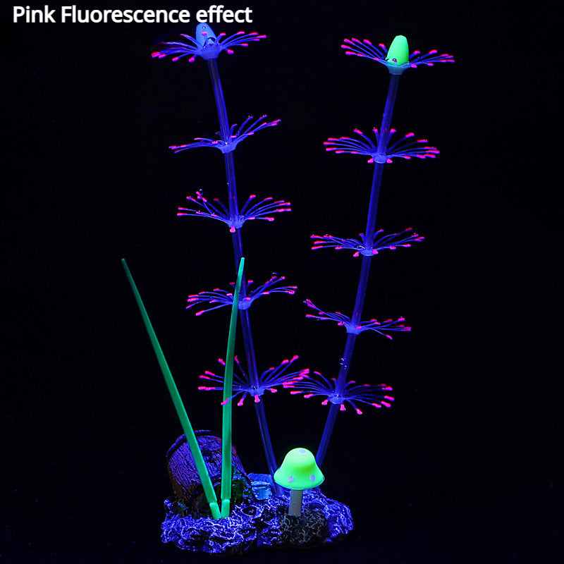 Efecto de fluorescencia rosa de pasto de agua de acuario con punta verde y un pequeño hongo sobre una roca.