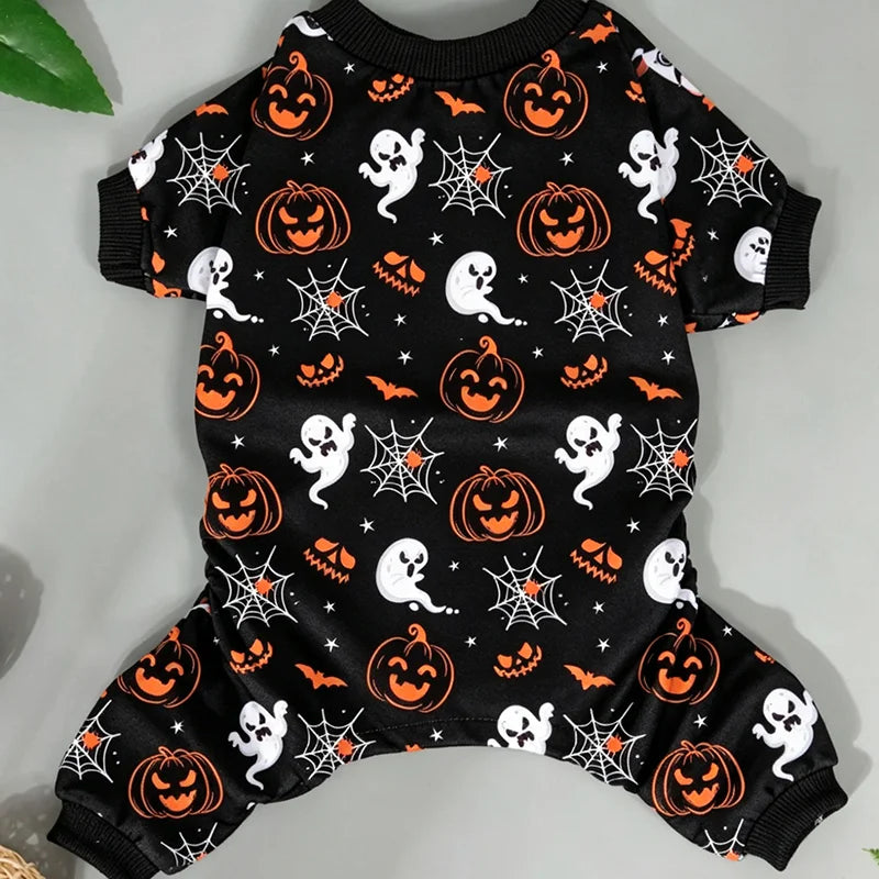 Black long-sleeved dog pajamas with an orange pumpkin and spiderweb Halloween print