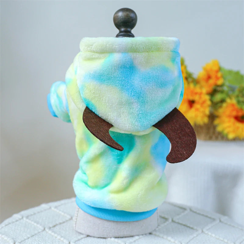 A plush fleece pet overalls for dogs and cats in yellow and blue tie-dye colors.