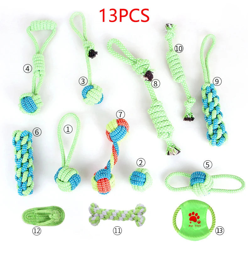 A collection of 13 pieces of green and blue cotton rope dog toys for interactive play