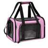 A pink soft-sided pet carrier for cats and small dogs with black handles and mesh window.
