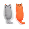 An orange plush cat toy with black markings and a soft thumb pillow design.