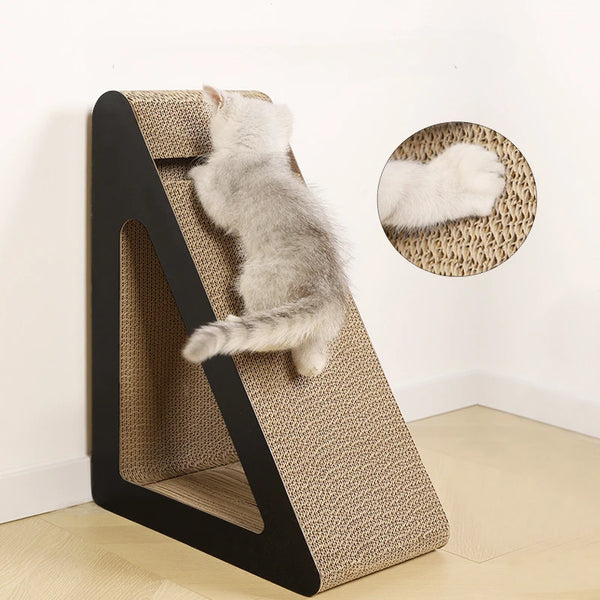 A fluffy gray cat is using a wooden cat scratcher with a rotating ball on a light-colored floor.