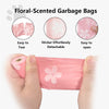 Pink floral-scented garbage bag being held by a hand, showing its tear-resistant and easy-to-open features.