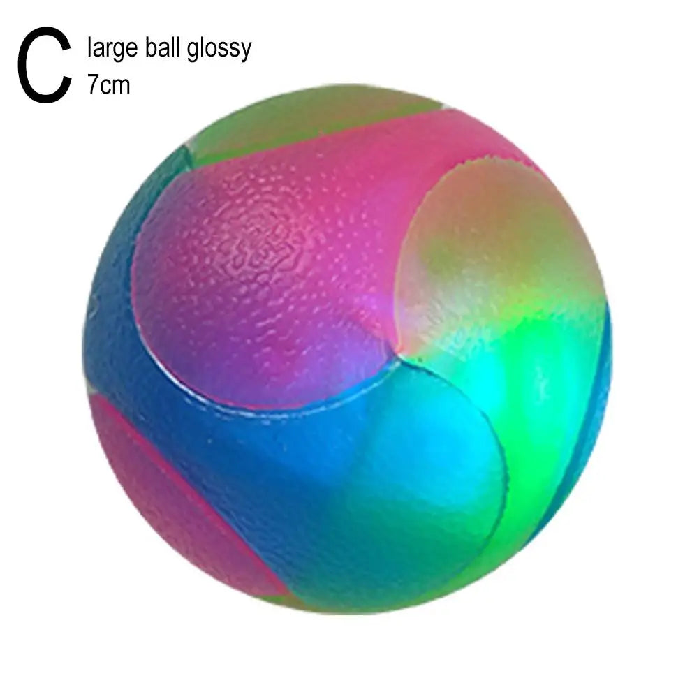 A glossy, large ball measuring 7cm, showing vibrant pink and blue iridescent colors.