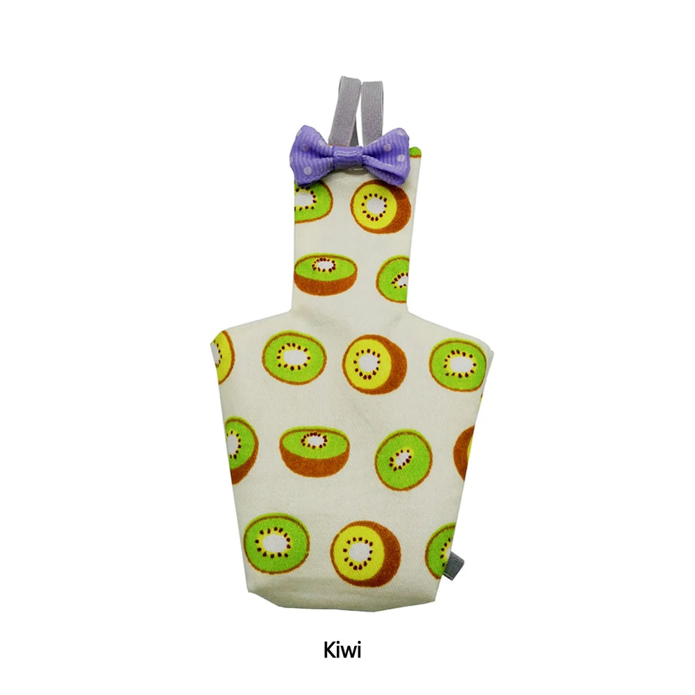 A white cotton bowtie flight suit for a small parrot featuring kiwi fruit patterns.