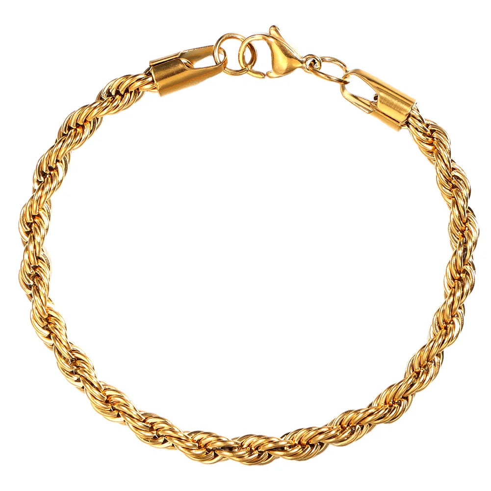 A gold-colored Cuban link bracelet with a chain design and a clasp.