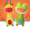 A yellow plush toy shaped like a giraffe and a green plush toy shaped like a frog against an orange background.
