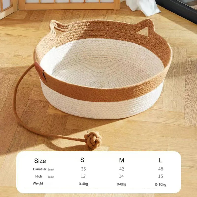 Handwoven rattan cat bed with cotton rope edge in beige and white colors.