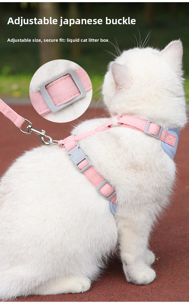 A white cat wearing an adjustable Japanese buckle harness and leash set for litter box use.