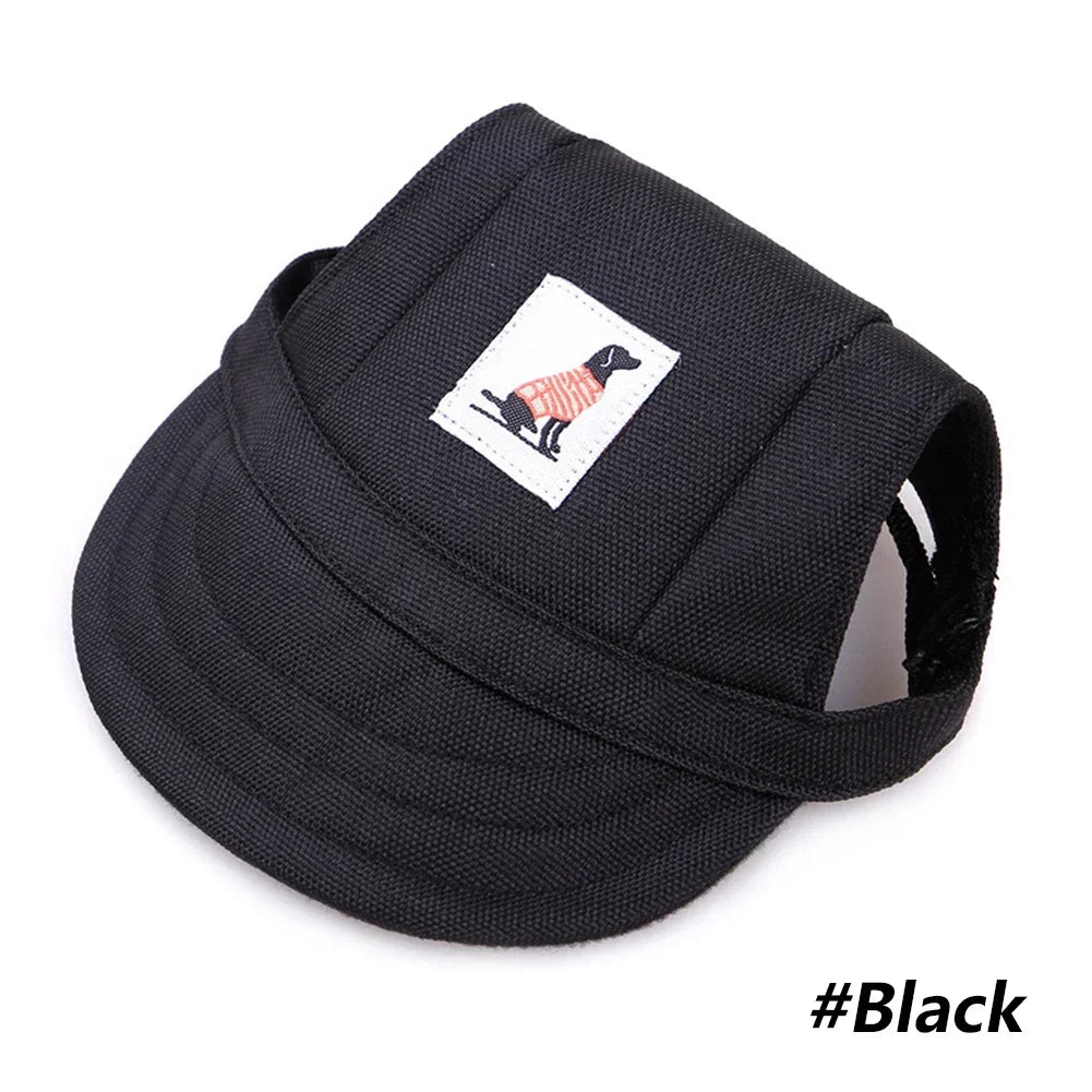 Black pet grooming visor cap featuring a silhouette of a dog on a white patch