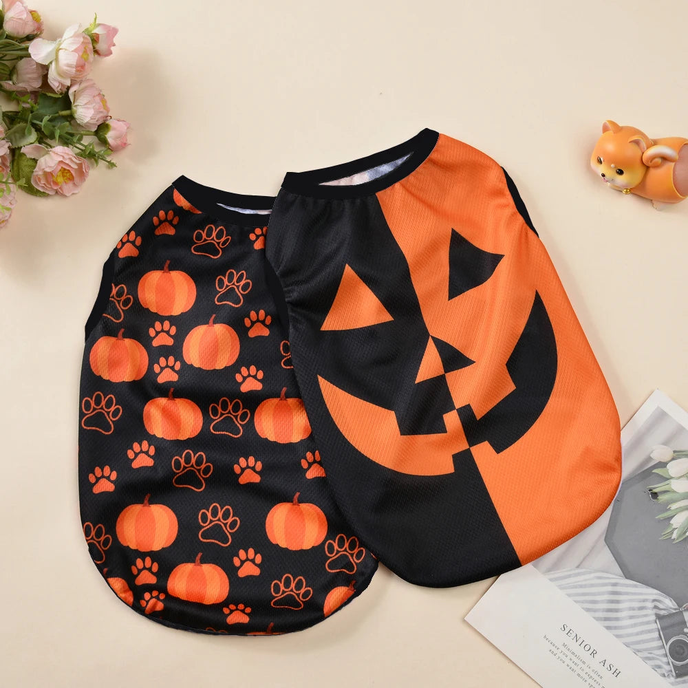 Orange and black pet t-shirt featuring a carved pumpkin print for small dogs and cats