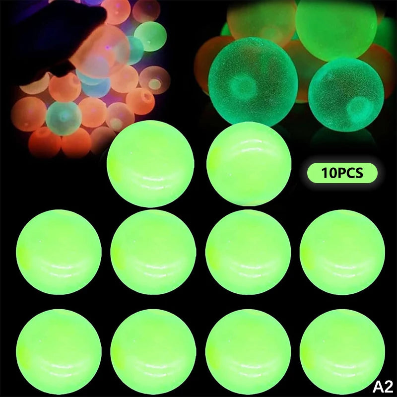 A set of ten glow-in-the-dark sticky sensory balls in various shades of neon green and yellow.